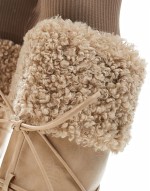 Crusader fur trim pointed knee boots in cream