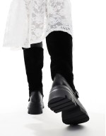Switch Up fluffy fur knee boots with buckles in black