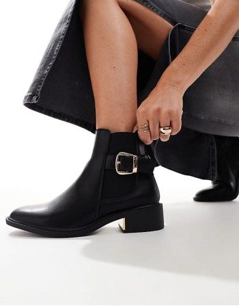 ‌Stylish ankle boots with buckle details in black