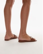 mule sandals with gold detailing in brown