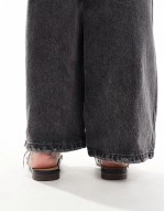 Lucia studded mule in black