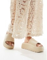 Wide Fit Freedom cleated flatform slider in off-white